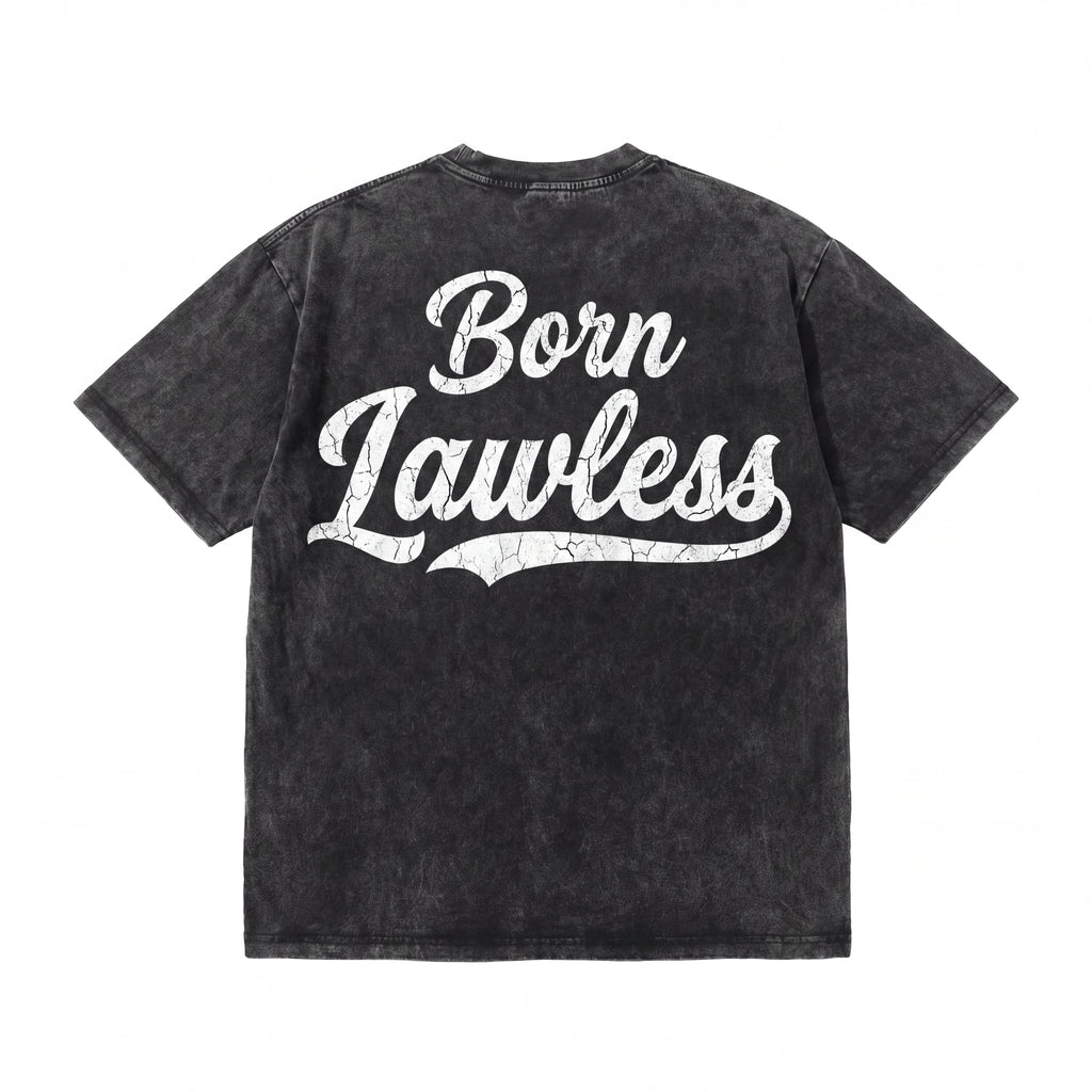 Black vintage-wash t-shirt with 'Born Lawless' cracked white lettering on back