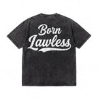 Black vintage-wash t-shirt with 'Born Lawless' cracked white lettering on back