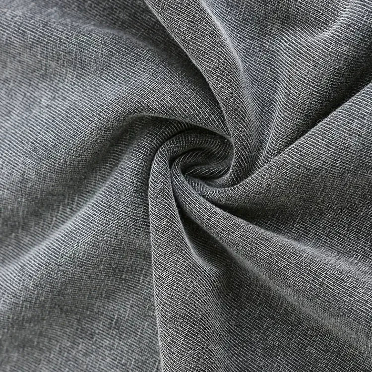Close-up of soft grey textured fabric with subtle heather pattern, twisted for detail