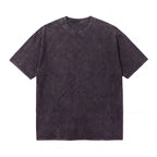 Washed black oversized t-shirt with short sleeves and crew neck on white background