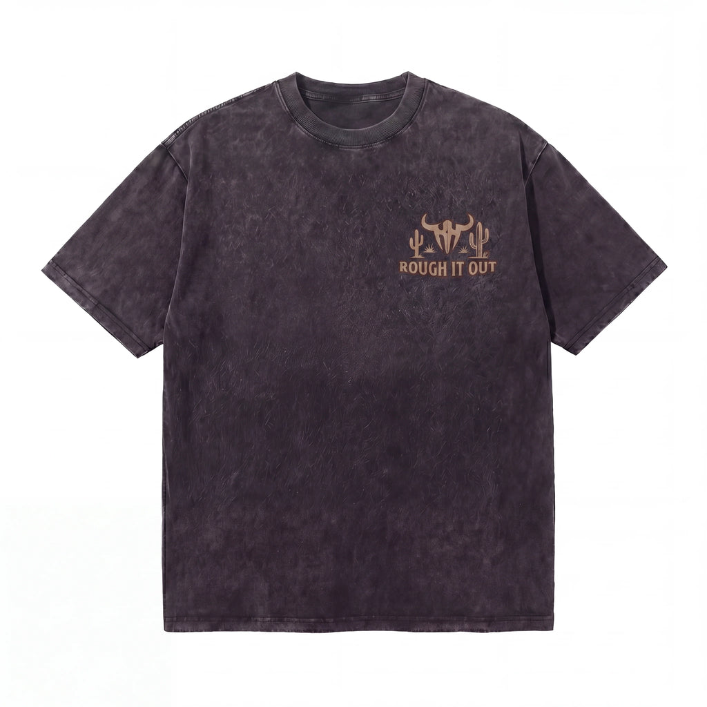 Washed black graphic t-shirt with 'Rough It Out' text and western bull skull design