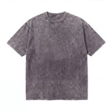 Washed grey short-sleeve cotton t-shirt with a subtle textured pattern, laid flat.
