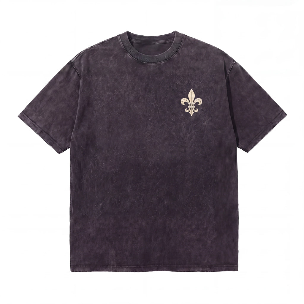 Black acid wash t-shirt with fleur-de-lis emblem on chest, casual streetwear style